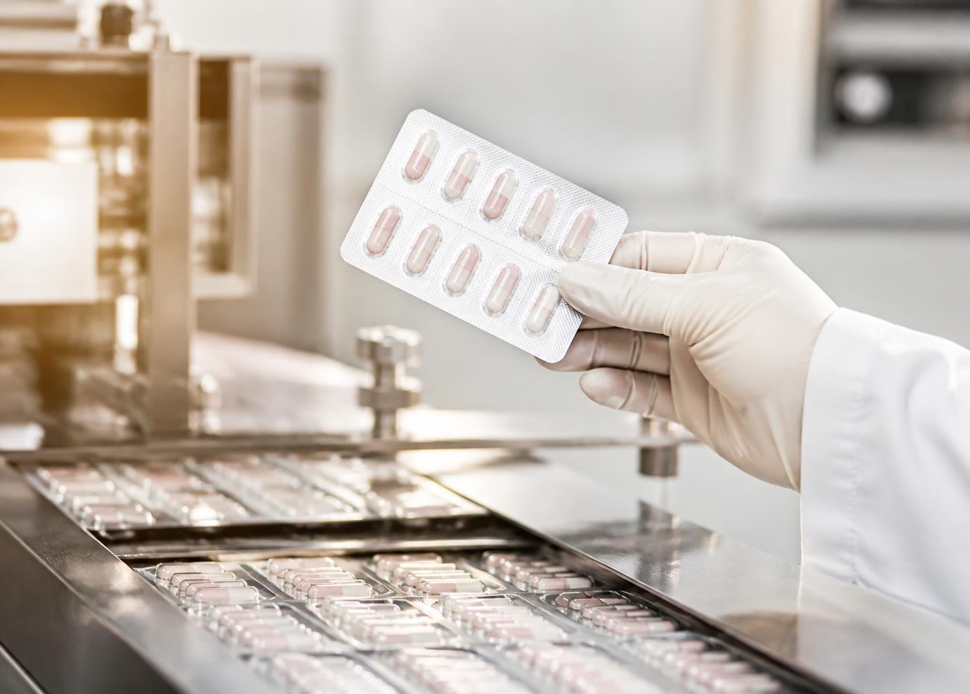 Sealed blister packaging being inspected on a clean production line